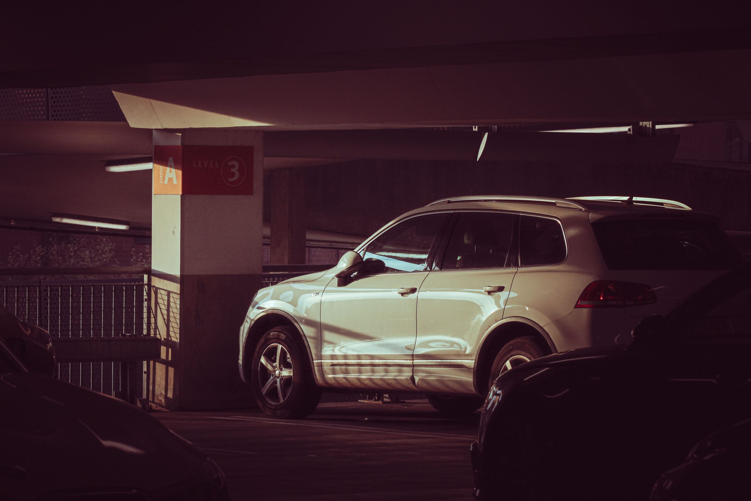 A Car Parked Undercover to Prevent it From Further Hail Damage